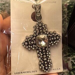 Elegant Silver Cross pendant with magnetic closure